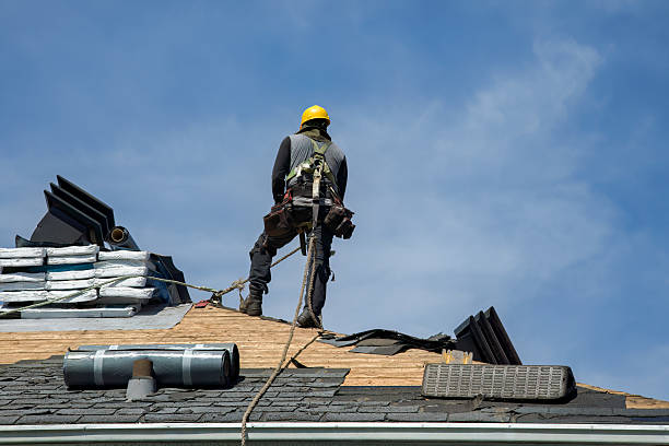 Professional Roofing technician working in Park City, UT